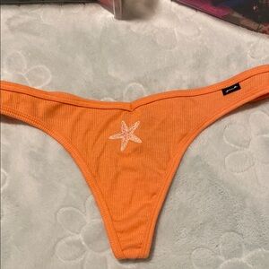 Orange Thong with Starfish